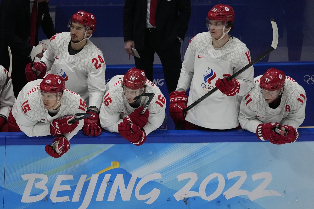 Russian Olympic Committee bench watches action against Finland during the men's gold medal hockey game at the 2022 Winter Olympics, Sunday, Feb. 20, 2022, in Beijing. (AP Photo/Jae C. Hong)