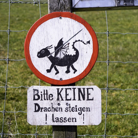 Lustige und verwirrende Schilder