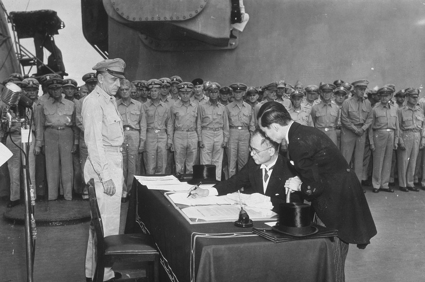 Japanese Minister of Foreign Affairs Mamoru Shigemitsu, signs the Japanese Instrument of Surrender aboard the USS Missouri in Tokyo Bay at the end of WWII, 2nd September 1945. (Photo by MPI/Getty Imag ...