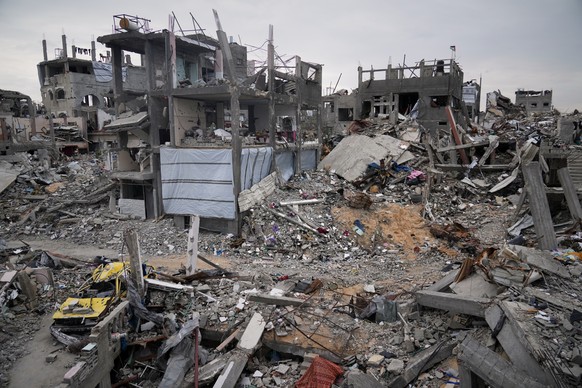 Ruins of apartments destroyed by Israeli strikes litter the area next to Khaled Nassar&#039;s home in the Jabaliya refugee camp in Gaza City Feb. 9, 2025. Nassar&#039;s daughter, Dalia, and his son, M ...