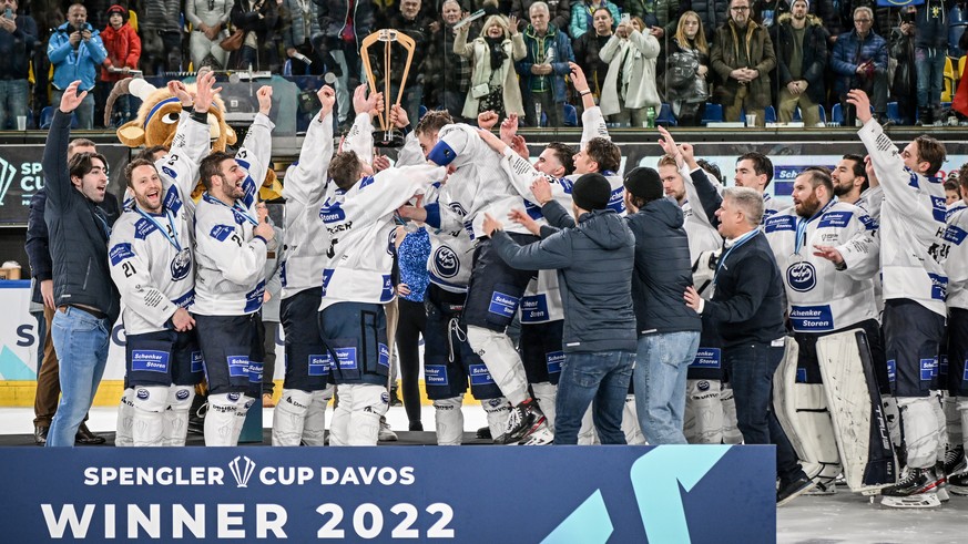 Team HC Ambri Piotta celebrate with the trophy after winning the final game between Czech Republic&#039;s Sparta Praha and Switzerland&#039;s HC Ambri-Piotta, at the 94th Spengler Cup ice hockey tourn ...