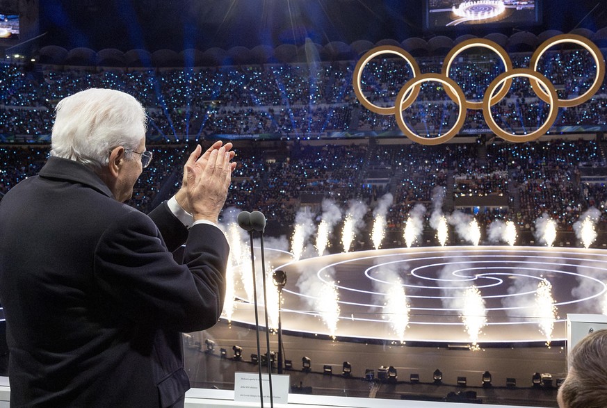 epa12711067 A handout picture made available by the Quirinal Presidential Palace (Palazzo del Quirinale) Press Office shows Italian President Sergio Mattarella applauding during the Opening Ceremony o ...