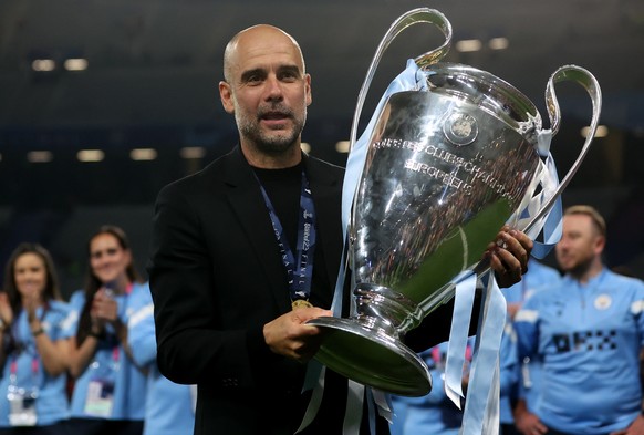 epa12983425 (FILE) - Manchester City manager Pep Guardiola poses with the trophy during the UEFA Champions League Final soccer match between Manchester City and Inter Milan, in Istanbul, Turkey, 10 Ju ...
