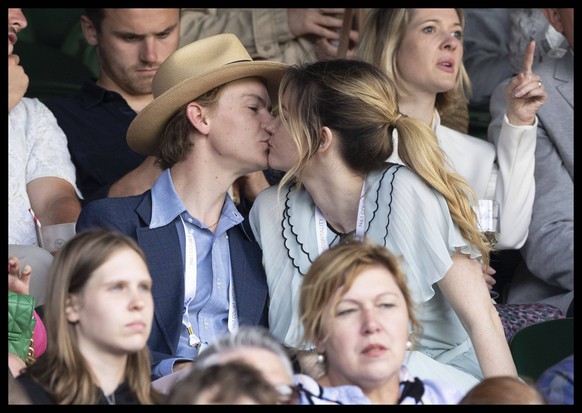 02/07/2022. London, United Kingdom. Thomas Brodie-Sangster and girlfriend Talulah Riley on day six of the Wimbledon Tennis Championships in London.