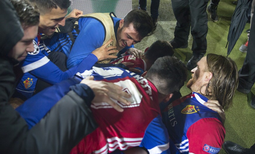 Players of the FC Basel celebrate with Basel&#039;s Michael Lang, right, the first goal during the UEFA Champions League Group stage Group A matchday 5 soccer match between Switzerland&#039;s FC Basel ...