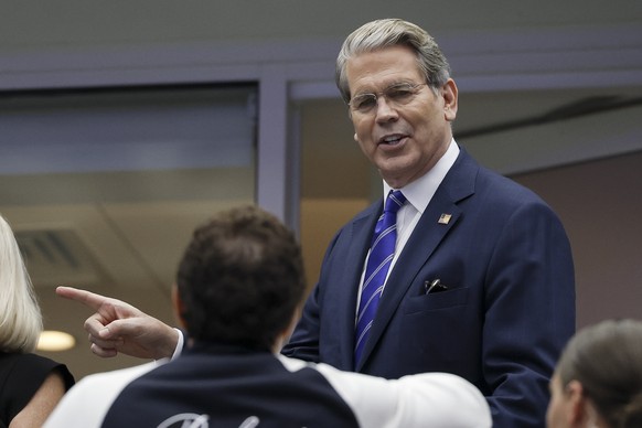 epa12360283 US Treasury Secretary Scott Bessent (R) arrives to the US Open Tennis Championships at the USTA Billie Jean King National Tennis Center, ahead of the mens singles final, in Flushing Meado ...