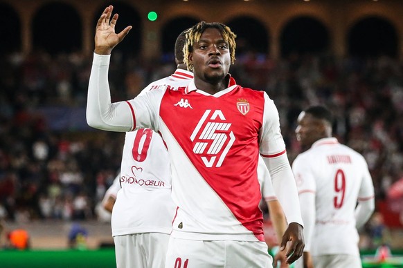 September 19, 2024, Monaco, France, Monaco: George ILENIKHENA of Monaco celebrates his goal during the UEFA Champions League, League Phase MD1 match between AS Monaco and FC Barcelona, Barca at Louis  ...