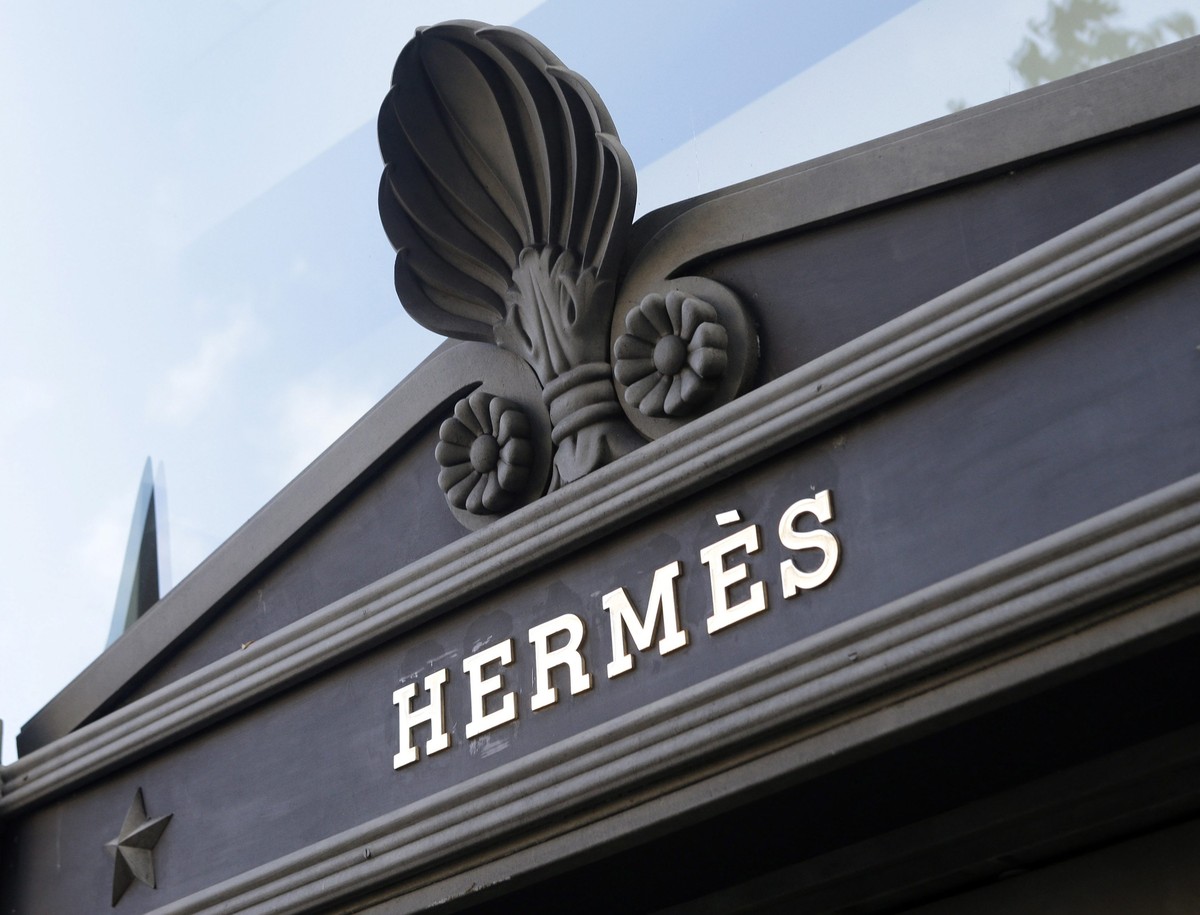 epa05152389 (FILE) A file photo dated 19 November 2013 showing the Hermes company brand sign in New York, USA. Hermes published their 4th quarter 2015 earnings, saying the Group's consolidated re ...