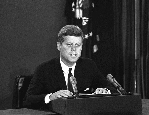 FILE - In this Oct. 22, 1962, file photo, President John F. Kennedy makes a national television speech from Washington. He announced a naval blockade of Cuba until Soviet missiles are removed. As the  ...