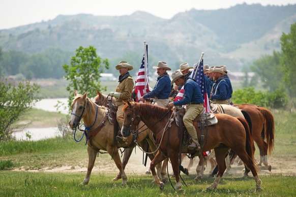 Roughrider reenactors wait for President Donald Trump's arrival at the opening of the Theodore Roosevelt Presidential Library, Wednesday, July 1, 2026, in Medora, N.D. (AP Photo/Matt Rourke)
APTO ...