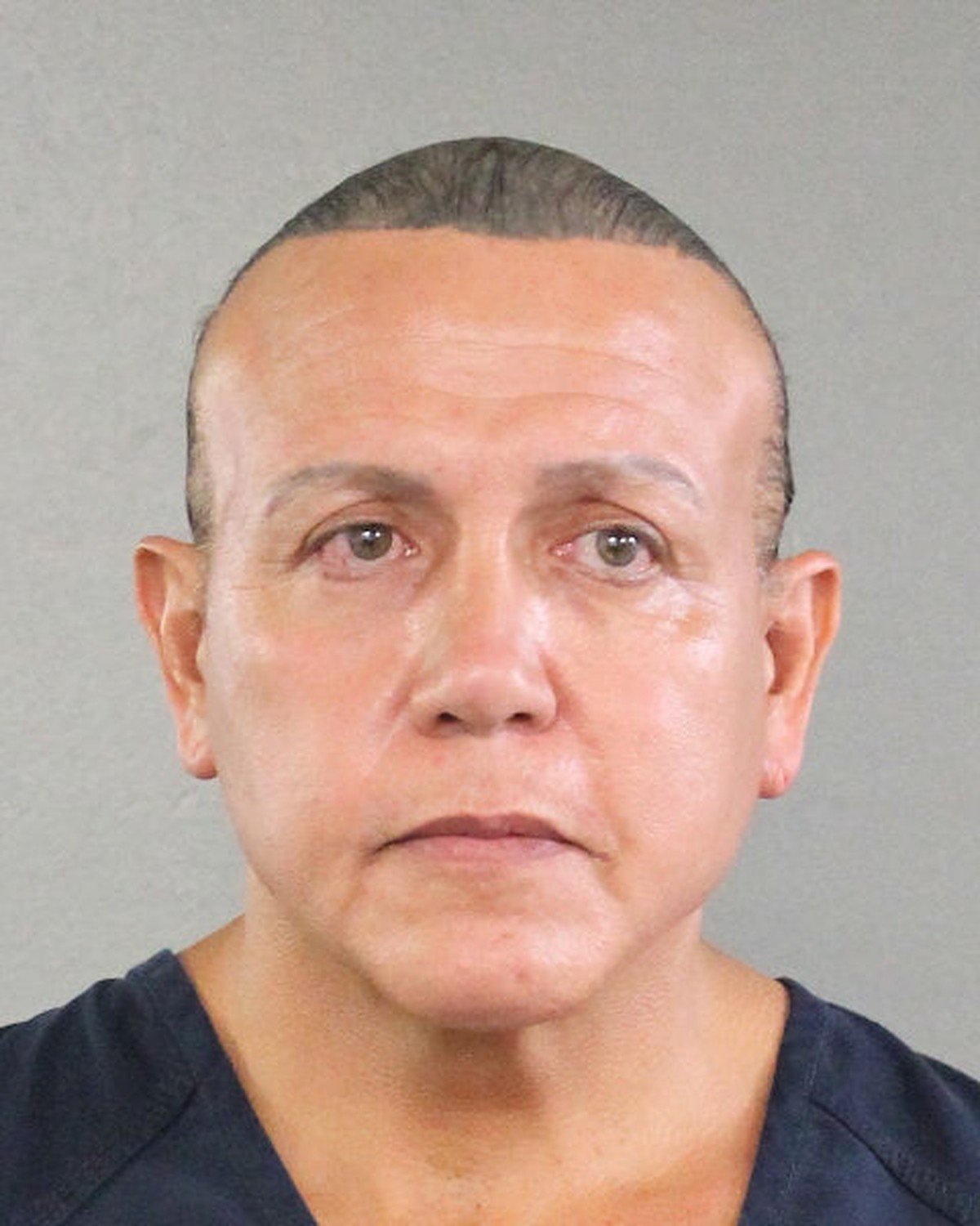 epa07121896 A handout photo made available by Broward Sheriff's Office shows a booking photo of Cesar Altieri Sayoc taken in August 2015 (issued 26 October 2018). Cesar Sayoc was arrested in Plan ...