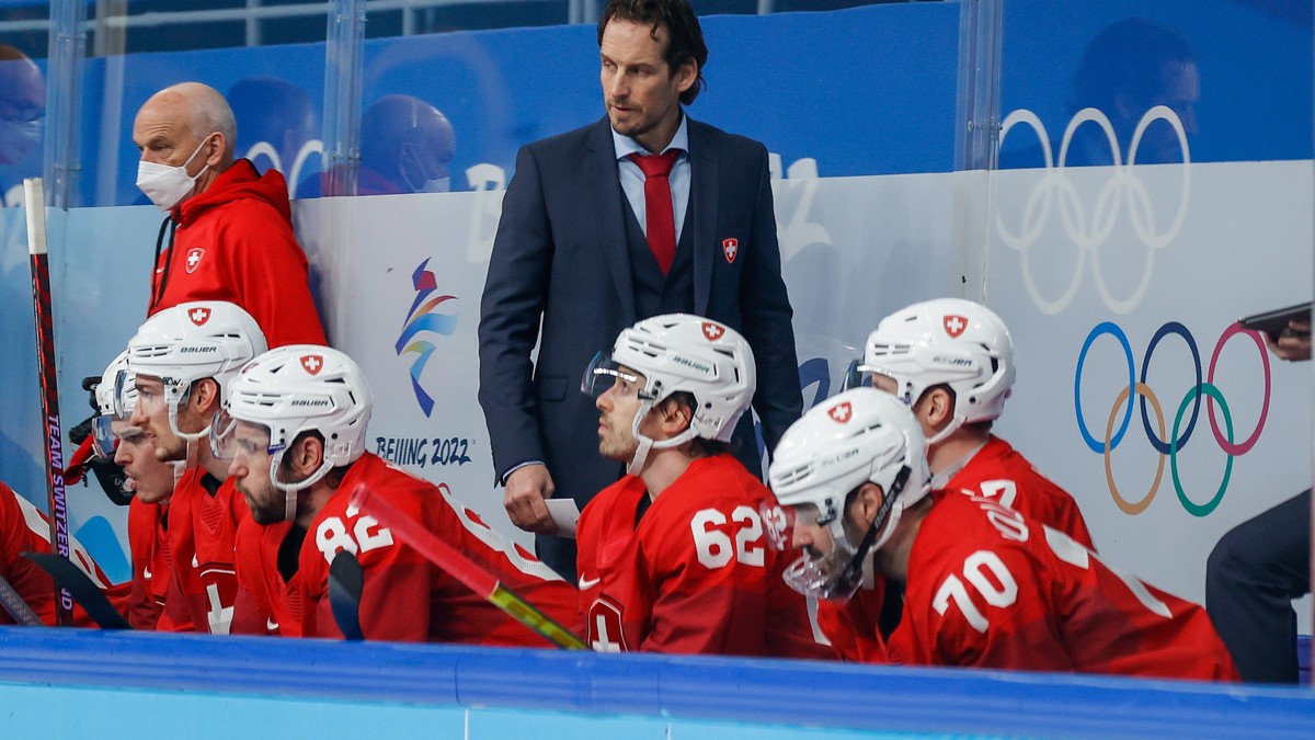 epa09750341 Switzerland head coach Patrick Fischer during the Men's Ice Hockey preliminary round match between Switzerland and Denmark at the Beijing 2022 Olympic Games, Beijing, China, 12 Februa ...