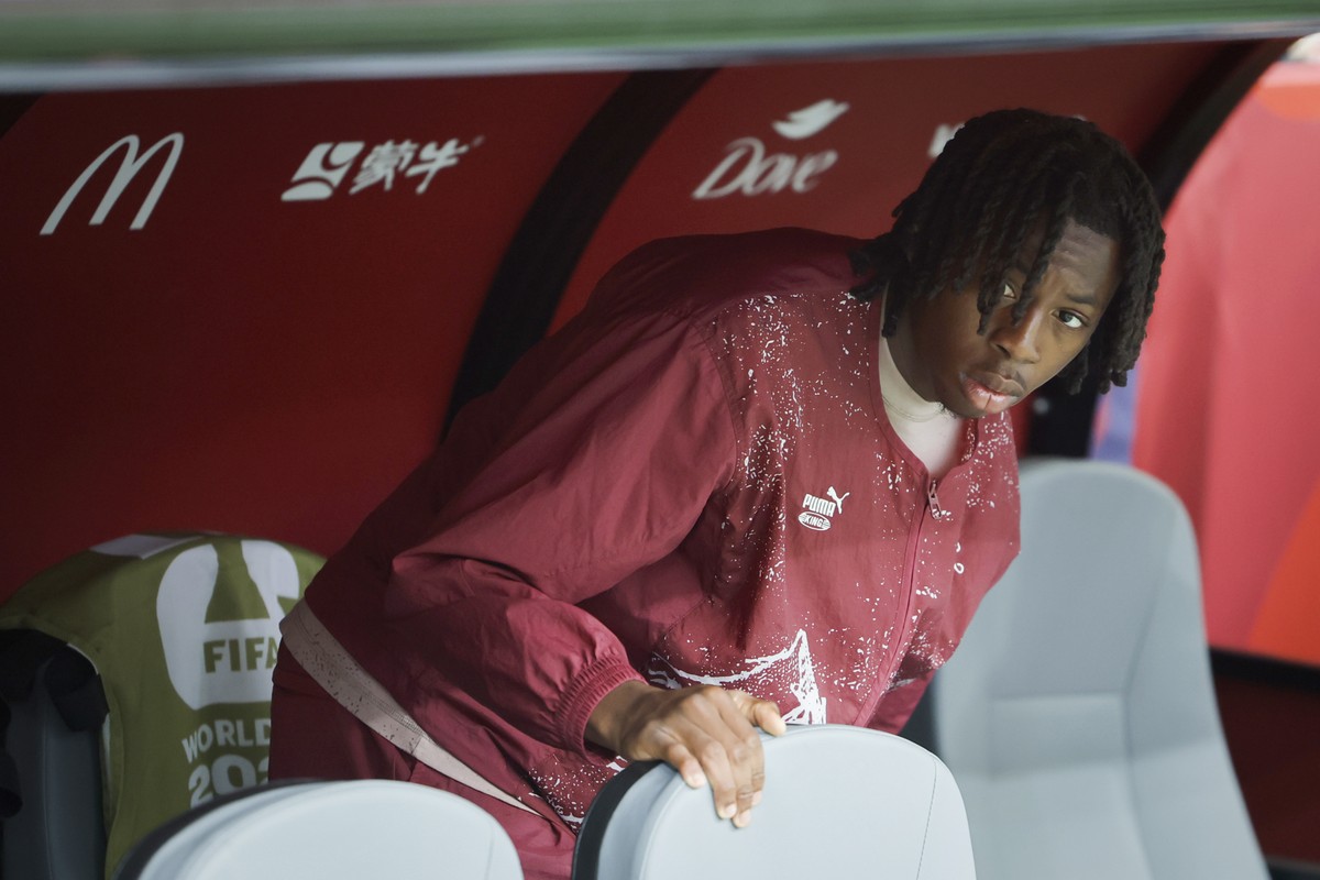 Switzerland's Johan Manzambi, who suffered an injury in a training sits on the bench prior the World Cup round of 16 soccer match between Switzerland and Colombia at the BC Place stadium in Vanco ...
