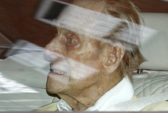 Britain&#039;s Prince Philip leaves the King Edward VII hospital in the back of a car in London, Tuesday, March 16, 2021. The 99-year-old husband of Queen Elizabeth II has been hospitalized after a he ...