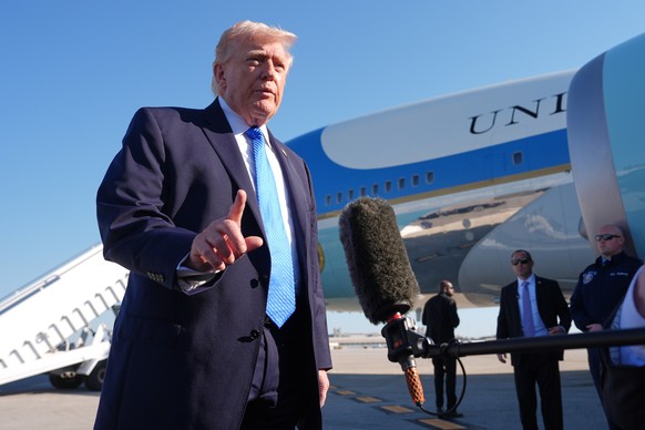 President Donald Trump speaks with the media before boarding Air Force One, Monday, March 23, 2026, at Palm Beach International Airport in West Palm Beach, Fla. (AP Photo/Mark Schiefelbein)
Donald Tru ...