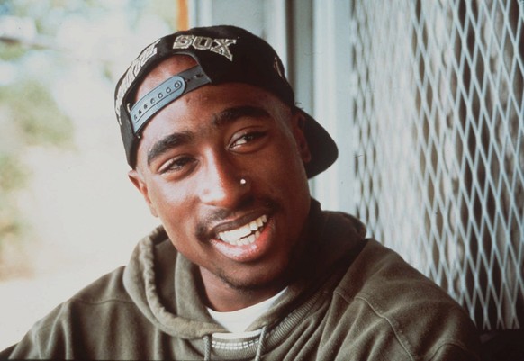 FILE - This 1993 file photo originally provided by Columbia Pictures shows rap musician Tupac Shakur is shown in a scene from, &quot;Poetic Justice.&quot; The upcoming Broadway musical inspired by Tup ...