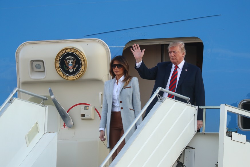 epa06891608 US President Donald J. Trump and US First Lady Melania Trump arrive at Helsinki Airport , in Helsinki, Finland, 15 July 2018. US President Donald J. Trump and Russian President Vladimir Pu ...