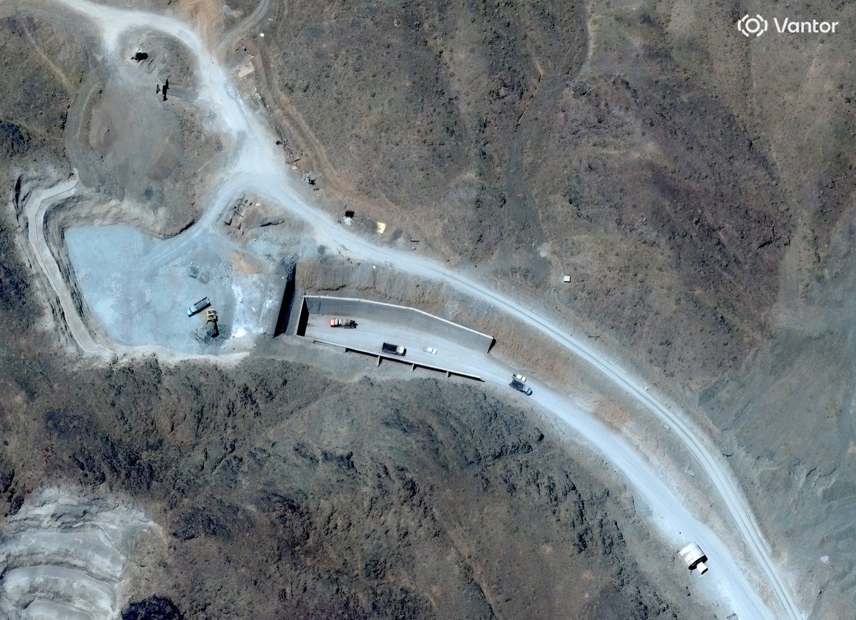 This satellite image provided by Vantor shows vehicles at the western tunnel entrance at Pickaxe Mountain, June 21, 2026. (Satellite image ©2026 Vantor via AP)
Iran US War