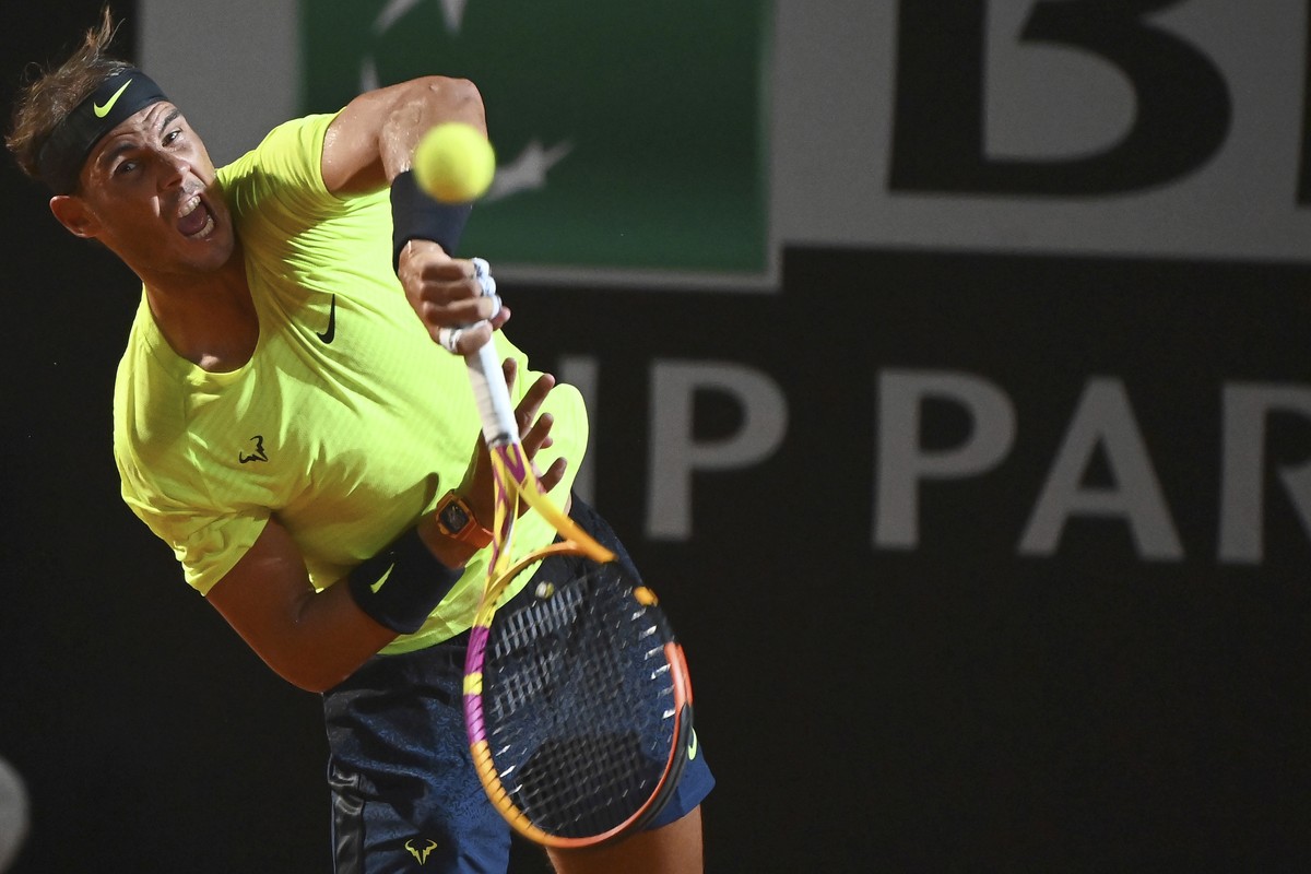 Spain's Rafael Nadal serves the ball to Serbia's Dusan Lajovic during their Italian Open tennis tournament match, in Rome, Friday, Sept. 18, 2020. (Alfredo Falcone/LaPresse via AP)