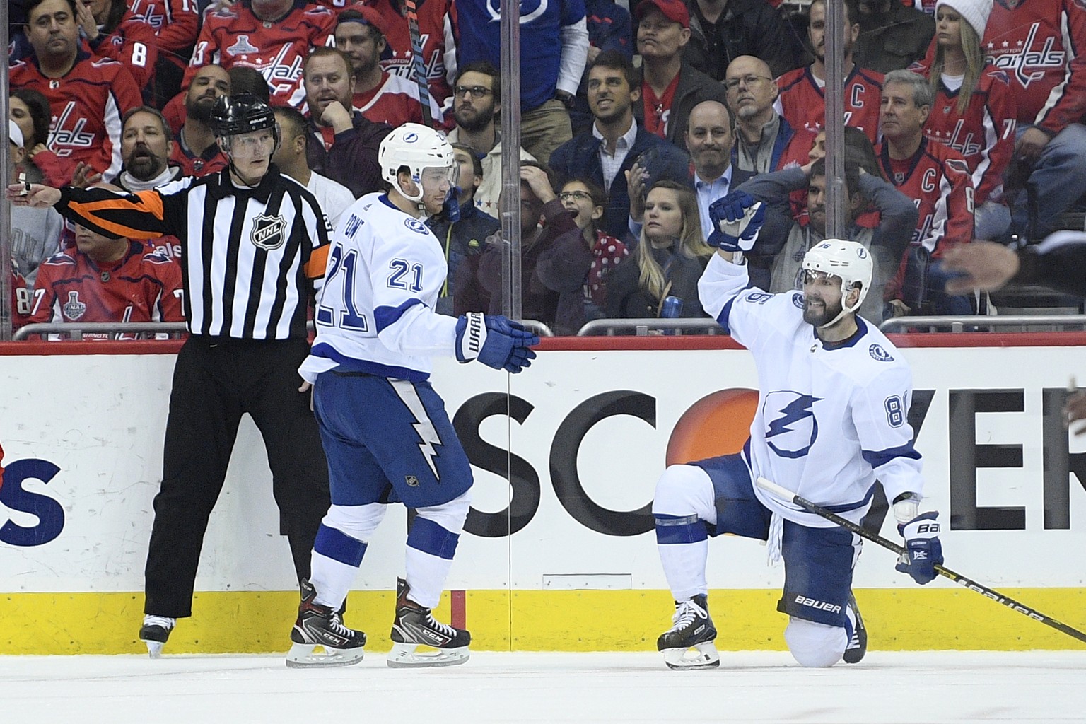 Tampa Bay Lightning right wing Nikita Kucherov, right, of Russia, celebrates his goal with center Brayden Point (21) during the second period of an NHL hockey game against the Washington Capitals, Wed ...