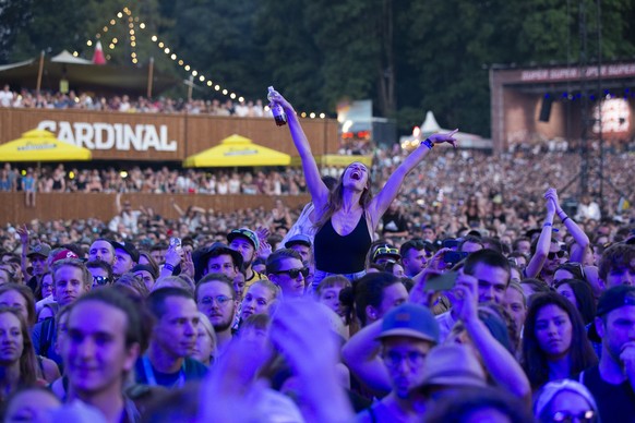 Spectators watch Swiss band &#039;Patent Ochsner&#039; performing on the main stage during the 36th edition of the Gurten music open air festival in Bern, Switzerland, Friday, July 19, 2019. The open  ...