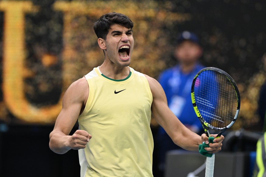 epa11086674 Carlos Alcaraz of Spain celebrates match point during his second round win over Lorenzo Sonego of Italy on Day 5 of the 2024 Australian Open at Melbourne Park in Melbourne, Australia, 18 J ...