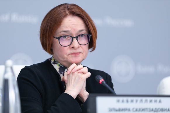 epa09916980 A handout photo made available by the press service of the Central Bank of Russian Federation (Bank of Russia) shows the Governor of the Bank of Russia Elvira Nabiullina attending a press  ...
