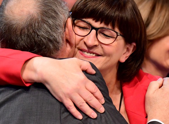 epa08049104 New Social Democratic Party (SPD) co-chairs Saskia Esken (R) and Norbert Walter-Borjans react after their election during the SPD party convention at CityCube in Berlin, Germany, 06 Decemb ...