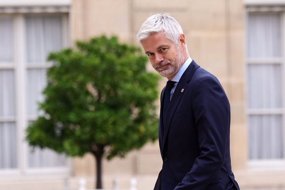 epa12444730 French member of the Parliament for the right-wing party 'Les Republicains' (LR), Laurent Wauquiez, arrives at the Elysee Palace for a meeting with French President Emmanuel Macr ...