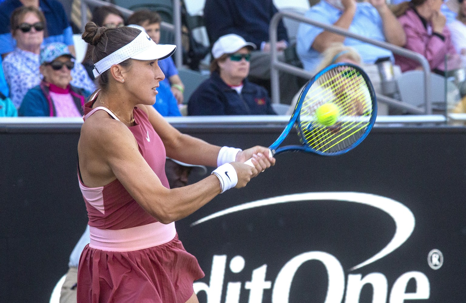 Belinda Bencic, of Switzerland, hits a return to Paula Badosa, of Spain, at the Credit One Charleston Open tennis tournament Friday, April 8, 2022, in Charleston, S.C. (Brad Nettles/The Post And Couri ...