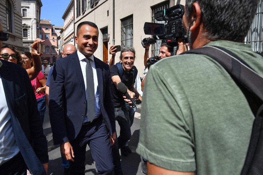 epa07814638 M5S (Five Star Movement) leader Luigi Di Maio returns to Chigi Palace after having lunch, in Rome, Italy, 03 September 2019. An online vote of grass-roots members of the anti-establishment ...