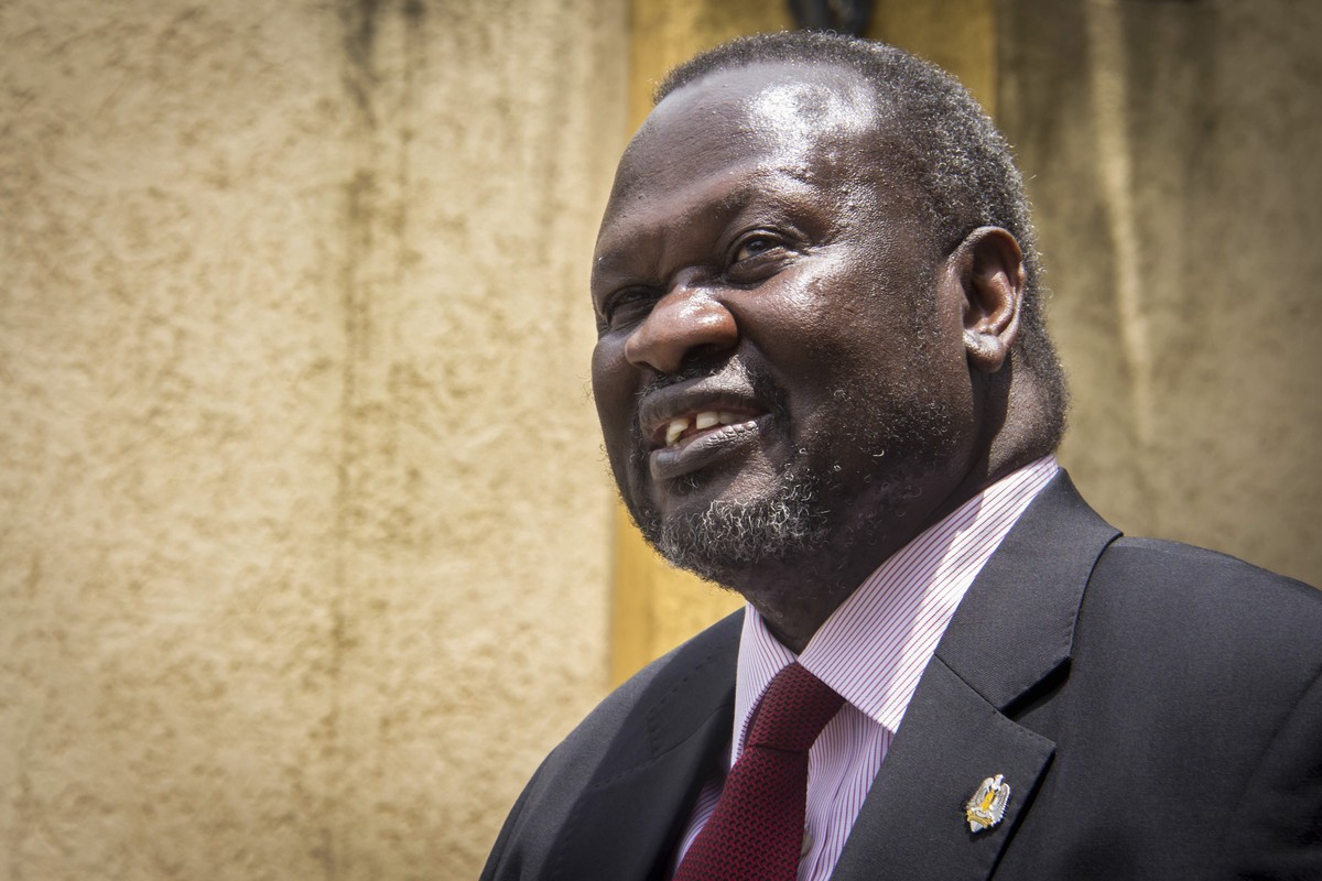 FILE - South Sudan's rebel leader Riek Machar speaks to the media about the situation in South Sudan following a peace agreement the week before with the government, in Addis Ababa, Ethiopia, Mon ...