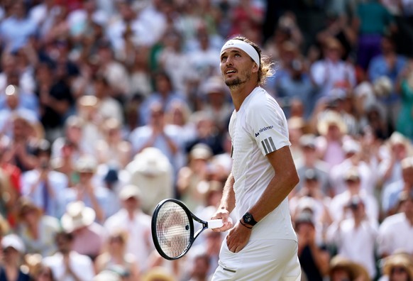 epa13102924 Alexander Zverev of Germany celebrates winning his Men's Singles semifinal match against Arthur Fery of Britain at the Wimbledon Championships in London, Britain, 10 July 2026. EPA/NE ...