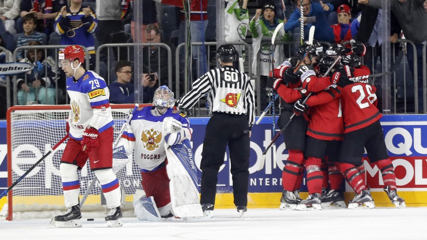 Canada&#039;s players celebrate a goal by Canada&#039;s Ryan O&#039;Reilly at the Ice Hockey World Championships semifinal match between Canada and Russia in the LANXESS arena in Cologne, Germany, Sat ...