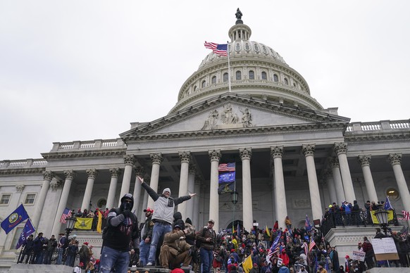 Rioters at the US Capitol on January 6, 2021 in Washington.  Hundreds of people accused of storming the U.S. Capitol three years ago have had a powerful incentive to plead guilty rather than go to prison.