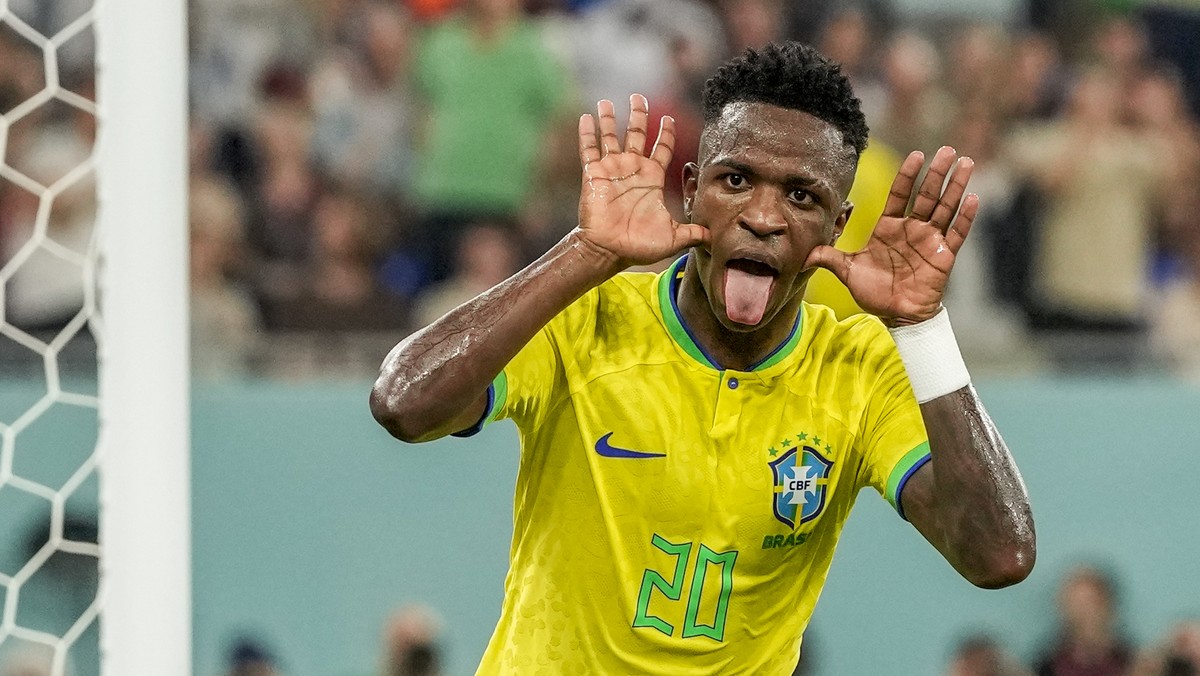 Brazil's Vinicius Junior celebrates after scores a disallowed goa during the World Cup group G soccer match between Brazil and Switzerland, at the Stadium 974 in Doha, Qatar, Monday, Nov. 28, 202 ...