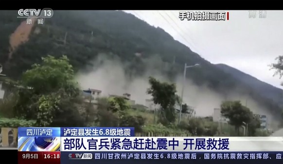 This image taken from video footage run by China's CCTV shows landslide following an earthquake in Luding County of southwest China's Sichuan Province Monday, Sept. 5, 2022. A strong earthqu ...
