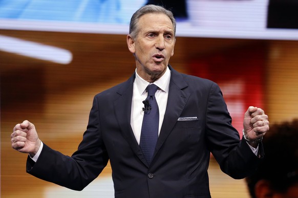 FILE - In this March 22, 2017, file photo, Starbucks CEO Howard Schultz speaks at the Starbucks annual shareholders meeting in Seattle. Schultz has told employees at an employee following the violence ...