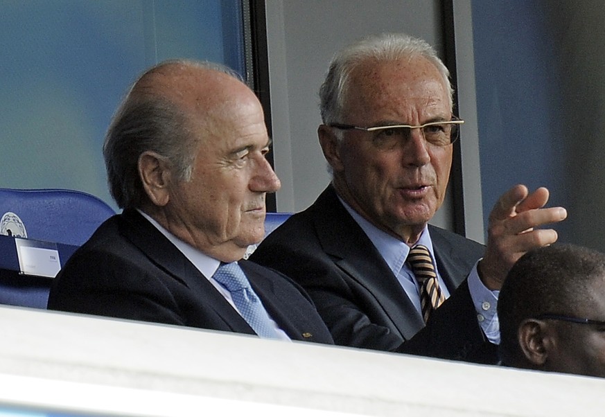 FILE - The Aug. 1, 2010 file photo shows FIFA president Sepp Blatter and German soccer legend Franz Beckenbauer, from left, on the tribune during the FIFA U20 Women&#039;s World Cup final soccer match ...