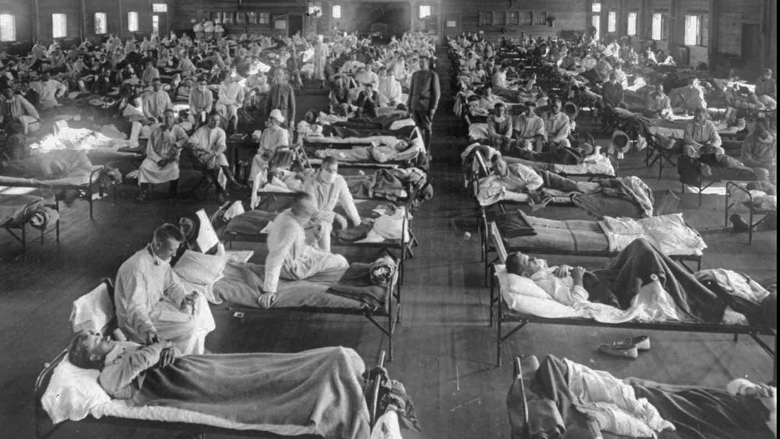 Influenza victims crowd into an emergency hospital near Fort Riley, Kansas in this 1918 photo. The 1918 Spanish flu pandemic killed at least 20 million people worldwide and officials say that if the n ...