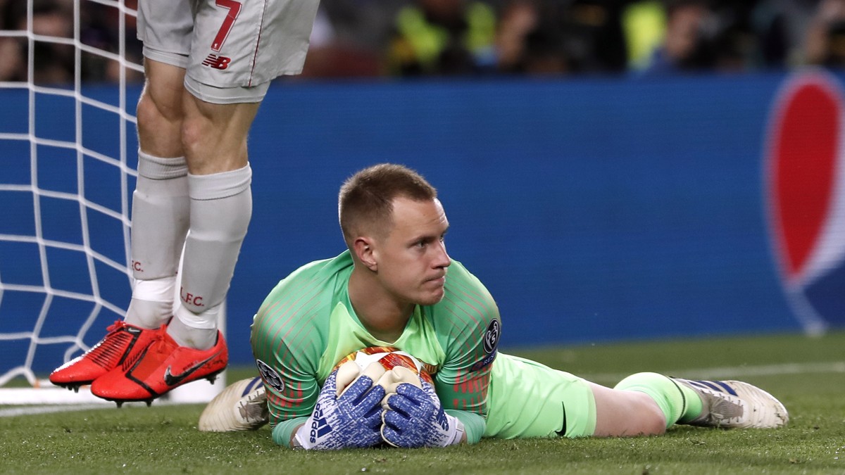 Liverpool's James Milner reacts after a save by Barcelona goalkeeper Marc-Andre ter Stegen, on the ground, during the Champions League semifinal, first leg, soccer match between FC Barcelona and  ...