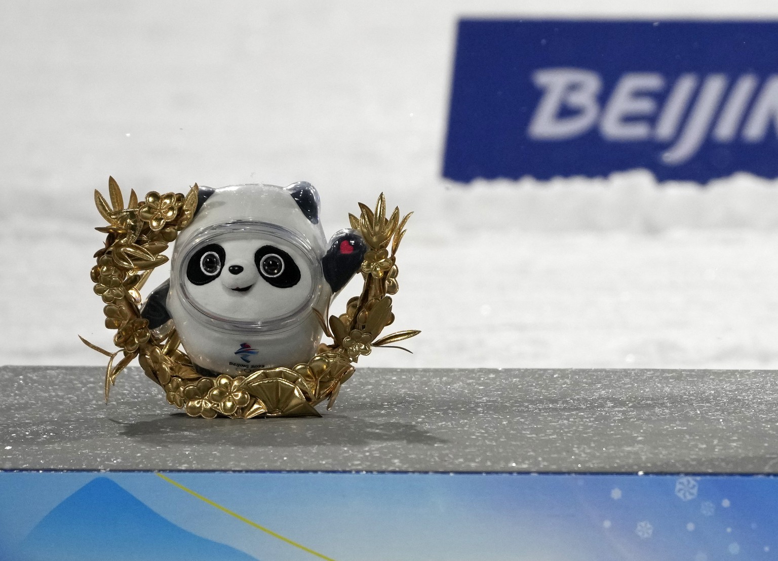 A Bing Dwen Dwen award was placed by silver medal finishers Germany for their missing teammate during a venue ceremony after the cross-country skiing competition of the team Gundersen large hill/4x5km ...