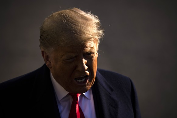 epa08933162 US President Donald J. Trump makes a statement to the gathered press as he departs the White House in Washington, DC, USA, 12 January 2021. The President is heading to Alamo, Texas to visi ...