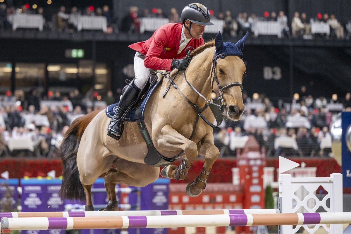 Switzerland's Pius Schwizer rides Just Special VK during the Longines FEI Jumping World Cup of the CHI Classics Basel international horse show at the St. Jakobshalle in Basel, Switzerland, on Sun ...