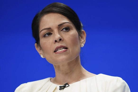 FILE - Britain&#039;s Home Secretary Priti Patel speaks at the Conservative Party Conference in Manchester, England, on Oct. 5, 2021. (AP Photo/Jon Super, File)