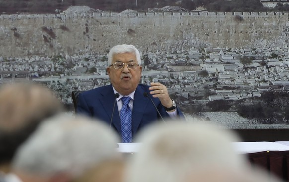 epa06736358 Palestinian President Mahmoud Abbas speaks during a meeting of the Palestine Liberation Organization (PLO) executive committee, at his headquarter in the West Bank town of Ramallah, 14 May ...