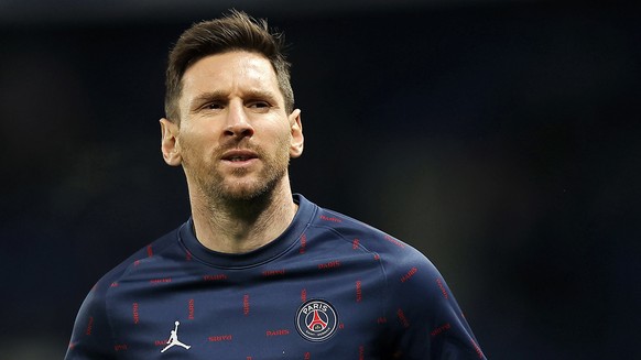 epa09627605 Paris Saint Germain's Lionel Messi warms up before the UEFA Champions League group A soccer match between Paris Saint-Germain (PSG) and Club Brugge in Paris, France, 07 December 2021. ...
