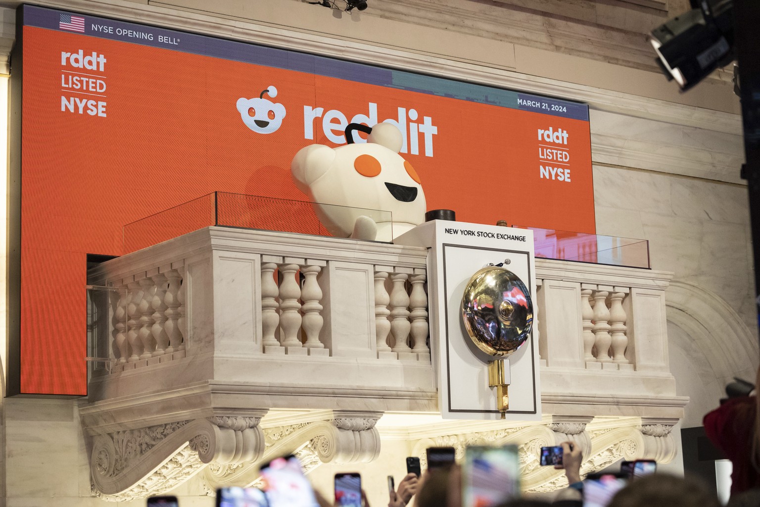 Reddit mascot Snoo rings the New York Stock Exchange opening bell, prior to the company&#039;s IPO, Thursday, March. 21, 2024. (AP Photo/Yuki Iwamura)