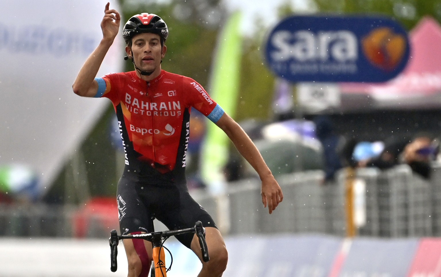 Switzerland&#039;s Gino Mader celebrates after winning the sixth stage of the Giro d&#039;Italia cycling race, from Grotte di Frasassi to Ascoli Piceno Thursday, May 13, 2021. (Massimo Paolone/LaPress ...