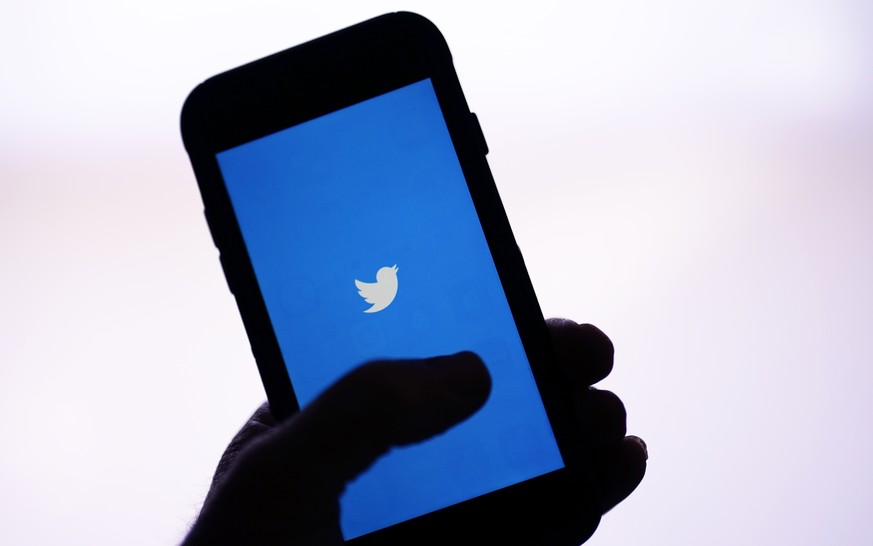 FILE - The Twitter application is seen on a digital device Monday, April 25, 2022, in San Diego. Twitter on Thursday, Dec. 16, 2022, suspended the accounts of journalists who cover the social media pl ...